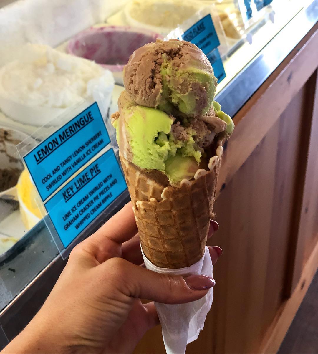 Red gingham curtain detail and window at the parlour